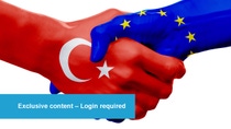 Two hands shaking, one with the Turkish flag and the other with the EU flag. A blue box reads, “Exclusive content – Login required.”