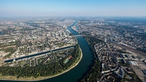 A photo of BASF's Ludwigshafen Verbund site along the river in daylight as seen from above. A photo of BASF's Ludwigshafen Verbund site along the river in daylight as seen from above.