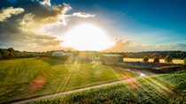 Biogas plant and corn field landscape; Shutterstock ID 1117990592; purchase_order: 03042023; job: Website Innovation und Sustainability Printing und Packaging; client: BASF SE, Frau Seiss; other: BASF SE, GBH/IM, Matthias Baque