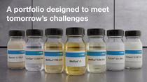 BASF concrete admixtures portfolio displayed in laboratory jars, including Vinapor, SureStar, HyCon, Starvis, and Melflux products.