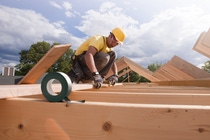 6105-05396035
© Masterfile Royalty-Free
Model Release: Yes
Property Release: Yes
Carpenter marking spacing of rafters with a pencil
