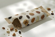 Empty cereal bar with some crumbs around the packaging 